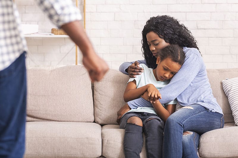 mother protecting daughter from father who is domestic abuse