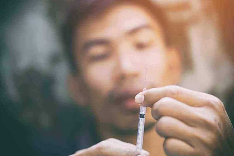 Phoenix man with drug needle